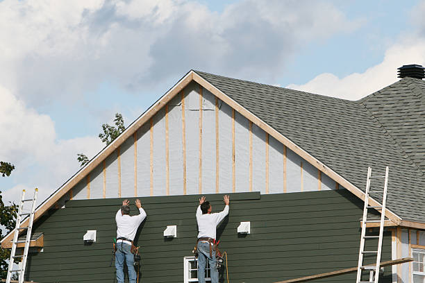 Professional Siding technician working in Warren, PA